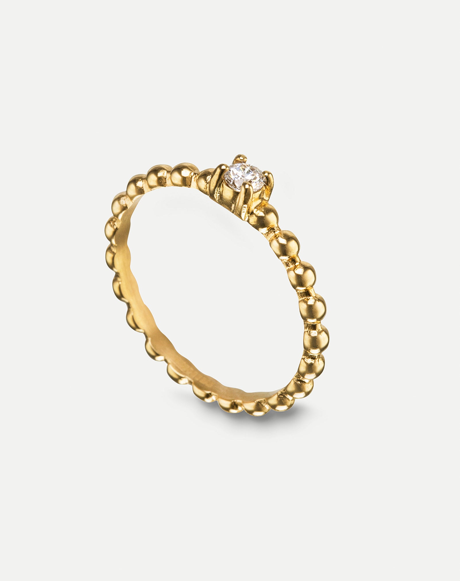 gold textured stack ring with crystal