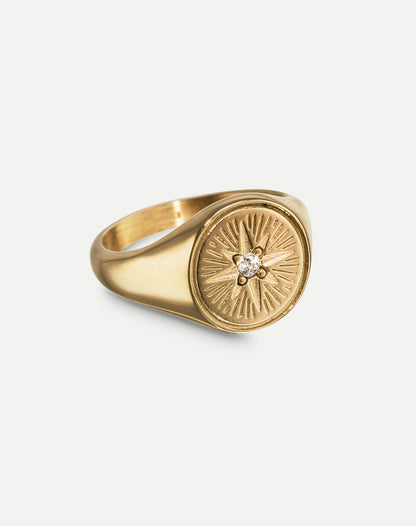 gold signet ring with crystal rich in tradition