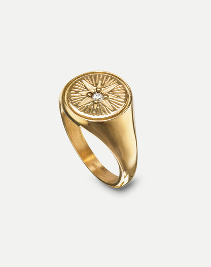 gold signet ring with crystal rich in tradition